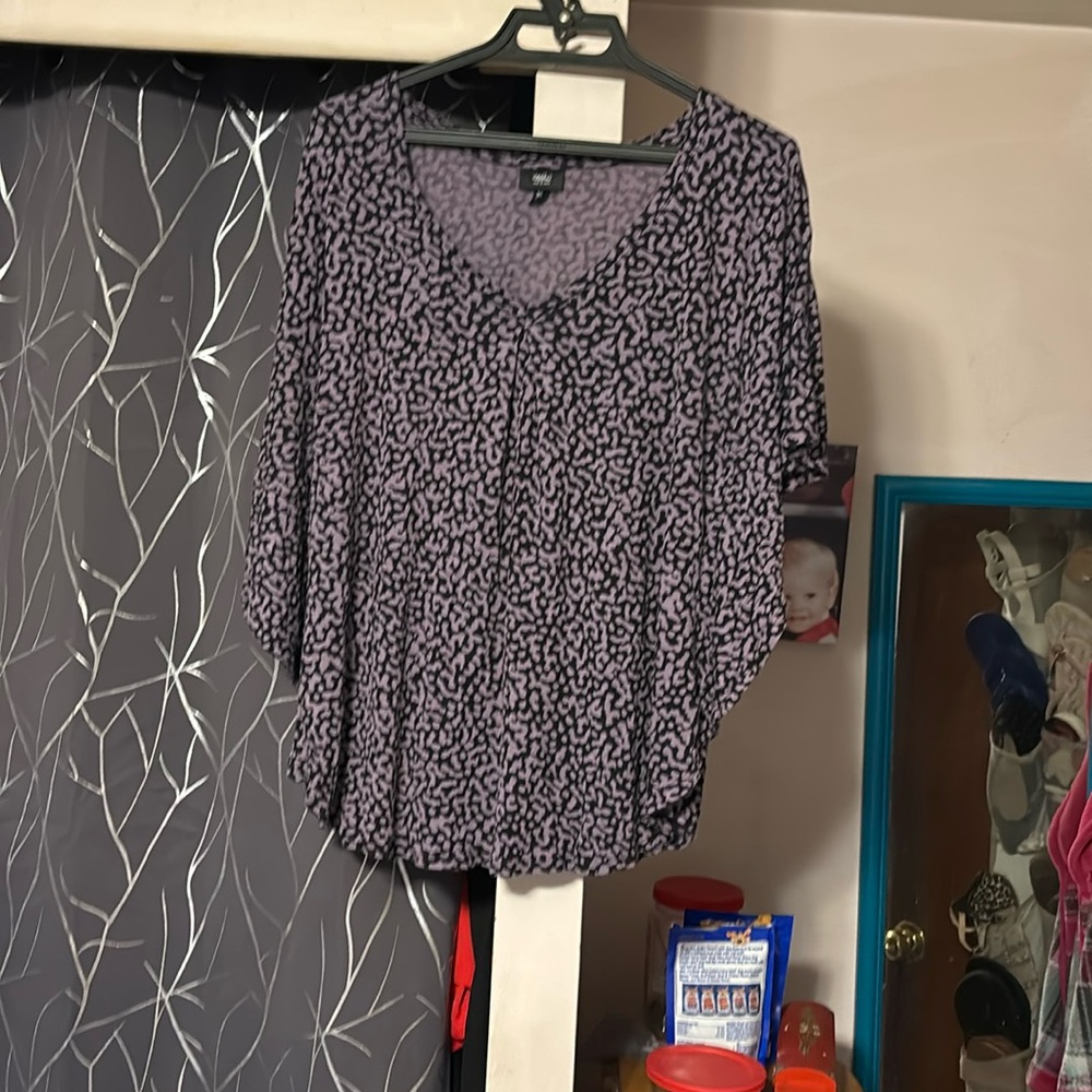 Purple and black top with winged sleeves, great condition fair